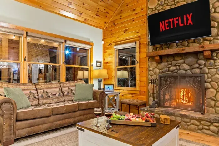 Crackling fire, plush seating, warm cabin ambiance — perfect after a day in Helen