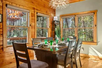 Bright dining nook with forest views — morning coffee here feels dreamy