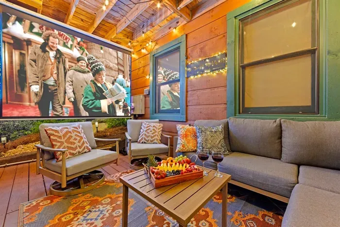 Cozy movie nights under twinkle lights — blankets, snacks, and pure relaxation