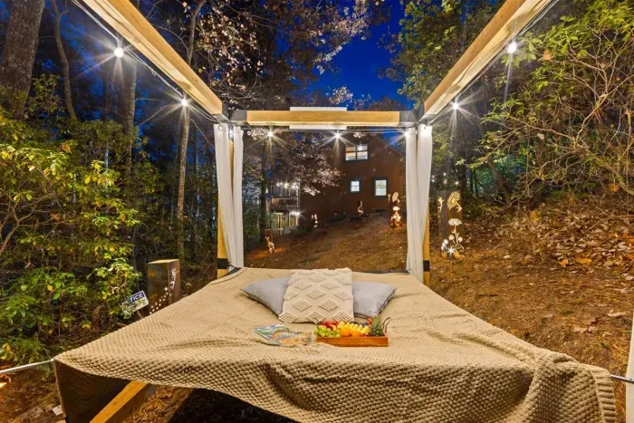 Lay back on the floating hammock under soft lights — peaceful, romantic, unforgettable