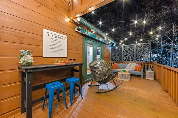 Sip, chat, and unwind under twinkle lights at your private outdoor lounge