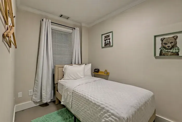 Twin bed off gameroom