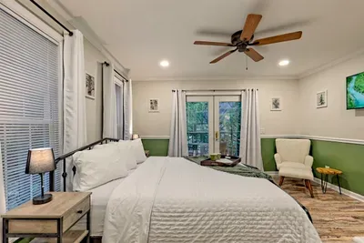 Primary bedroom with reading chair