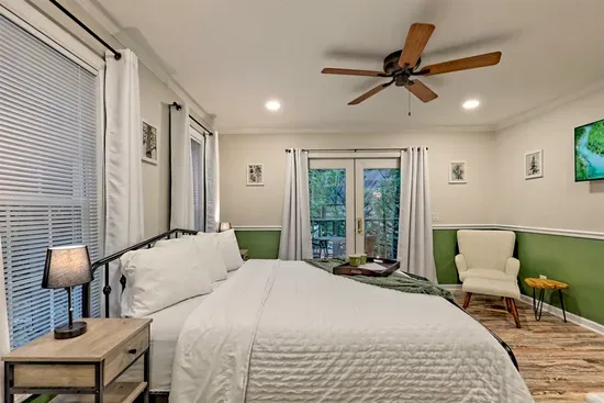 Primary bedroom with reading chair