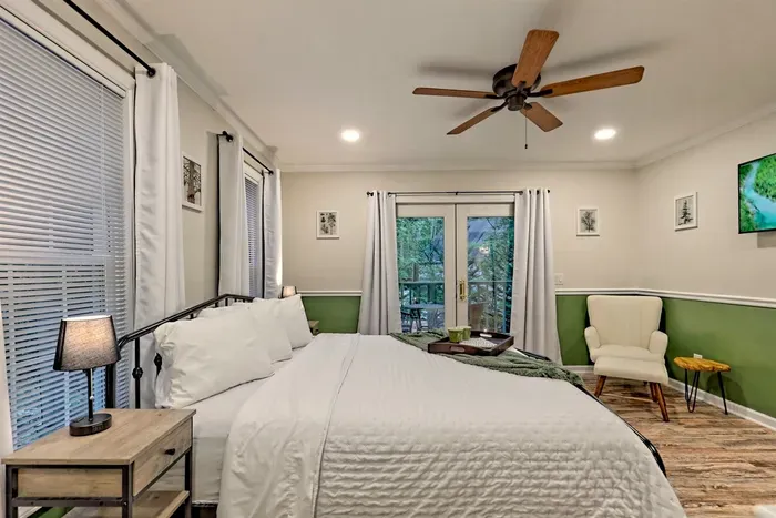 Primary bedroom with reading chair