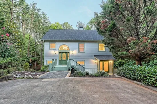 Front of house with parking