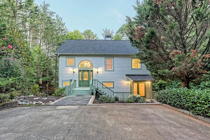 Front of house with parking