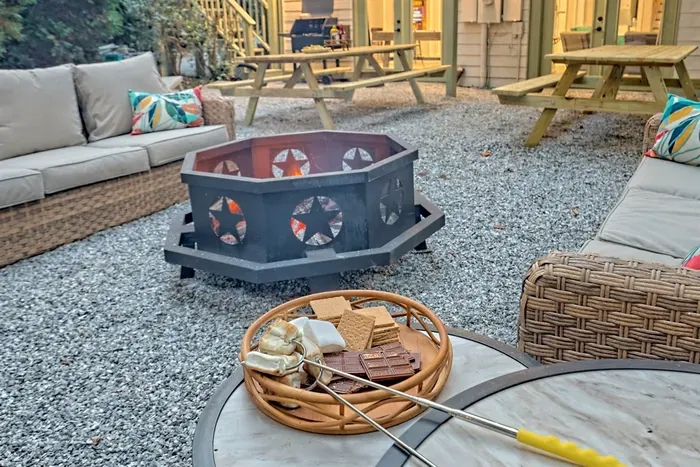 "Gather around the cozy firepit at Helen Waldhaus and enjoy a perfect evening roasting s'mores under the stars."