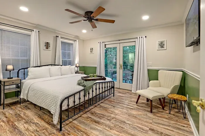 Primary king suite with private bathroom — a peaceful space to recharge