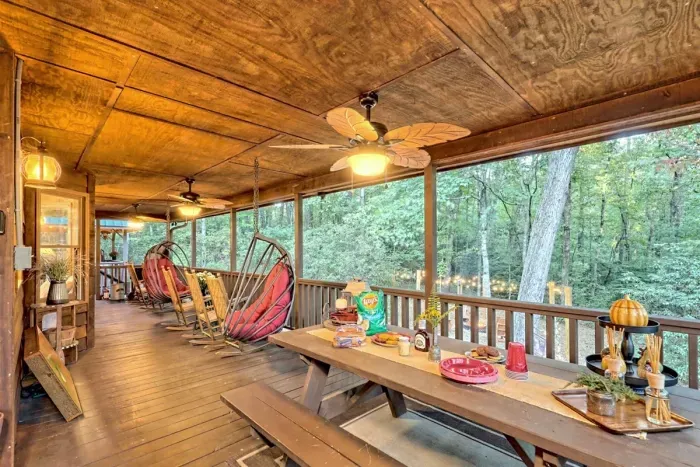 Covered outdoor dining area with picnic table seating — ideal for family meals and evening gatherings.