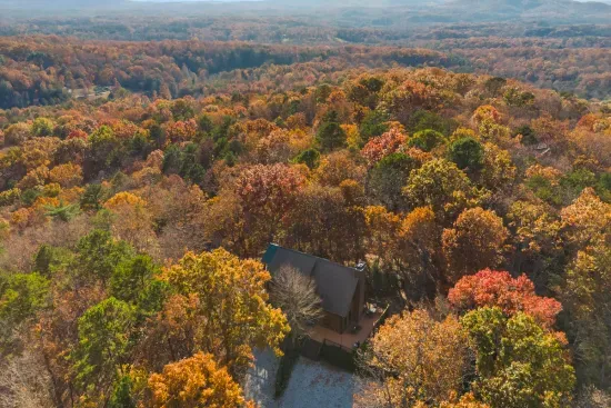 Tucked away in the trees, with miles of fall color all around.