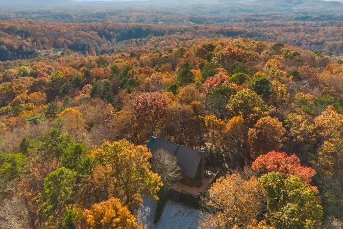 Tucked away in the trees, with miles of fall color all around.