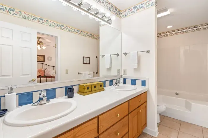 Spacious bathroom with double vanity — ideal for groups getting ready at the same time.