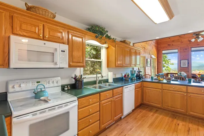Open sightlines between kitchen and living space keep everyone connected.