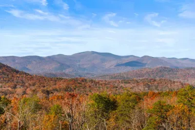 Watch the mountains come alive with fall color from Ridge Haven.