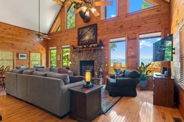 Floor-to-ceiling windows frame the mountains from the heart of the home.