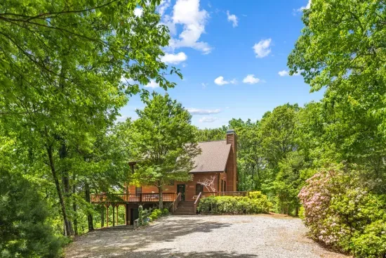 A peaceful, elevated approach — arriving feels like stepping into your own mountain retreat.