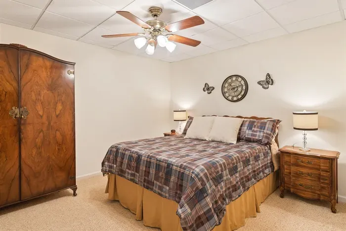 Downstairs queen bedroom offering privacy and convenient access.