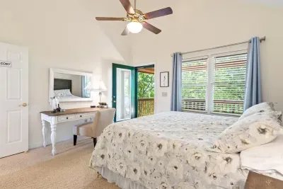 Another private king bedroom with additional space for getting ready or unwinding.