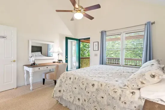 Another private king bedroom with additional space for getting ready or unwinding.