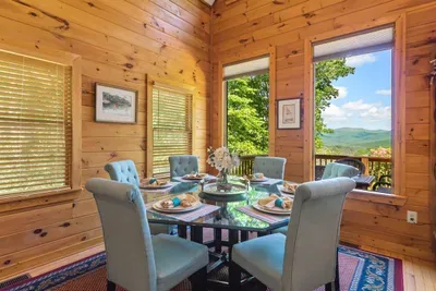 Dine together while taking in sweeping mountain views through oversized windows.