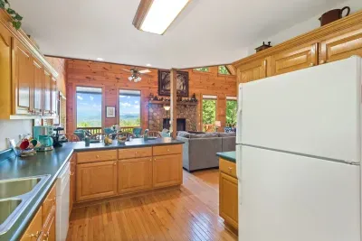 Fully stocked kitchen with generous counter space for group meals and shared mornings.