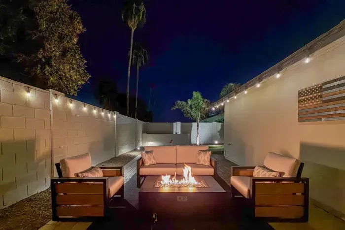 Fire pit area with comfortable seating.