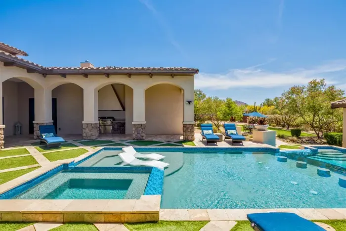 Expansive backyard with 12 person hot tub