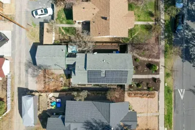 Solar panels power the property; low water-usage outdoor drip system keeps things eco-friendly.