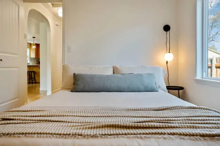 New and luxurious modern linens on a comfortable queen bed (front bedroom)
