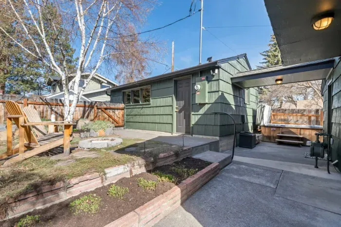Back patio and side yards are fully fenced to keep your pets and children safe. The hot tub has a lock and is accessible only to guests with a code.