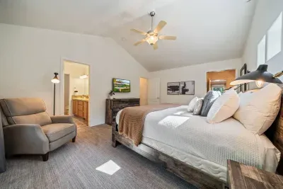 Primary Suite with king bed, reading corner, Roku TV