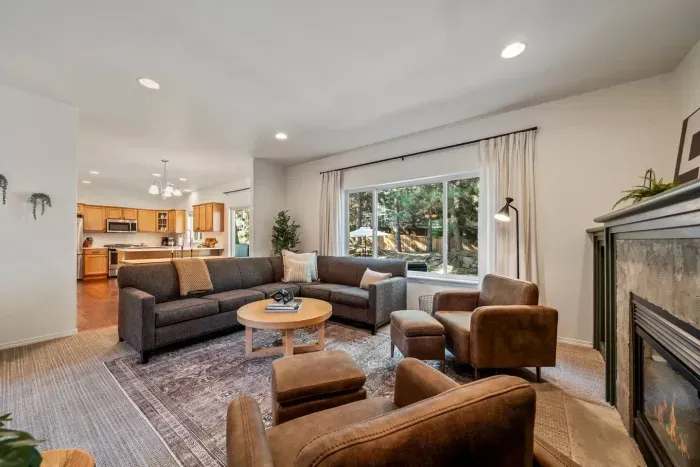 Newly updated living room with modern furnishings and Roku TV