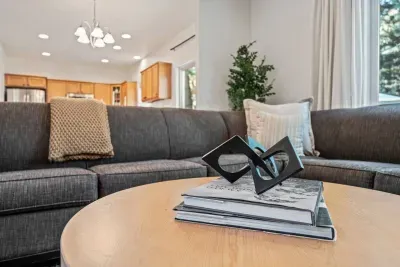 Newly updated living room with modern furnishings and Roku TV