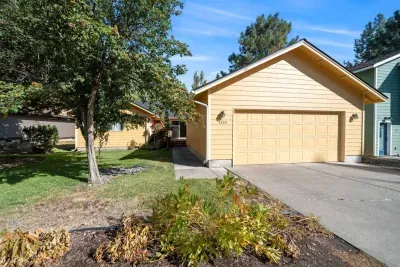 Beyond the back deck in a quiet grassy yard for pets and children to play. This yard is off of the back alley with very little traffic. Yard is now fenced. Guests have access to garage parking (2 spaces) and private driveway parking (2 spaces).