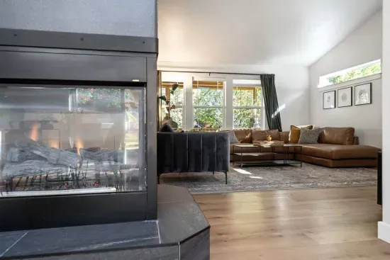 Stunning 3-sided fireplace in the center of the home