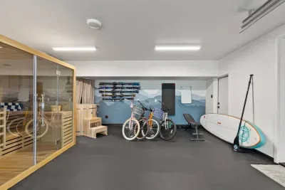 There is no shortage of lifestyle amenities here - from the sauna to cold plunge, stand up paddle boards and bikes, and a private place to exercise, you won't want to leave!