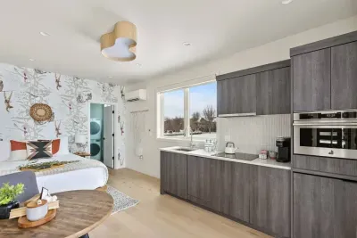 Bedroom Four: is actually a lock-off studio that will be open for your use when you book the entire place! It has everything you could need apart from the main home: full kitchen (minus freezer), queen bed, dinette, smartTV, full bathroom and laundry