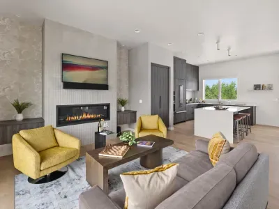 Modern open living space with fireplace, TV, and stylish kitchen island