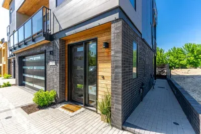 Entrance to home welcomes you with modern architecture. Private studio access from the walkway to the right (included if you are renting the whole property "Millpointe Modern 4.0)