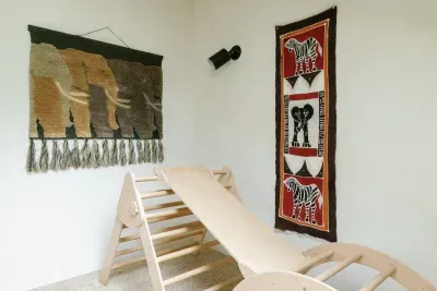 Minimalist lounge nook with artisan decor and cozy safari-inspired style