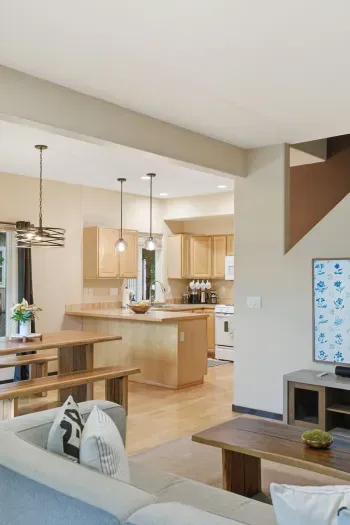Bright open-concept kitchen and living area with island seating