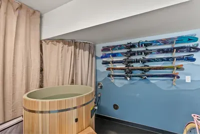Private cedar soaking tub with stylish ski-lodge vibes