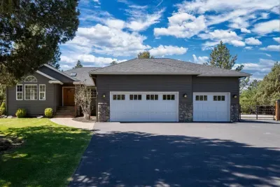 Hello curb appeal! Plenty of parking (even for your RV too!) on a long driveway tucked back from the street. Very private lot.
