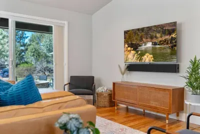 Flatscreen TV and sound bar - stream your favorite shows on this smart TV or use the soundbar to play your favorite music via bluetooth