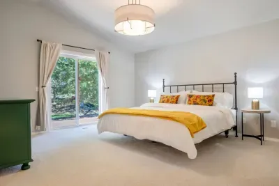 You won't be in a shortage of space in this primary suite! This room has direct access to the hot tub off the deck.