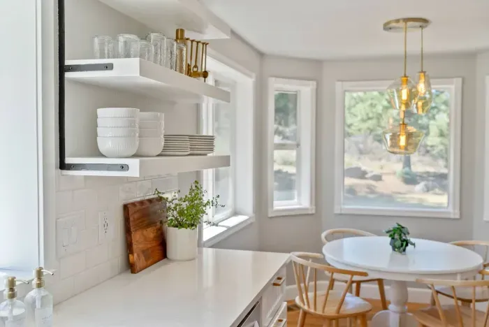 Modern kitchen stocked with all of the necessities to make a meal and entertain