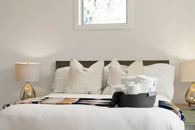 Bedroom 4: Queen bed with closet, Smart TV, dresser and access to a shared bath (jack n' jill connected full bath). Bedrooms come with full sets of linens, pillows, and extra blankets and pillows.