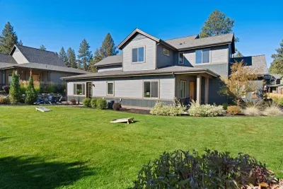 Yard: expansive, grassy, flat yard with access off of back patio and side door from main living area. Plenty of room for corn hole (provided on site) or to throw around the ball! Please note this is an unfenced yard.