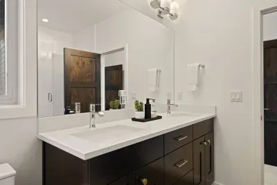 Bathroom 3: Shared between two upstairs queen bedrooms, it is connected in a jack n' jill style layout. Includes dual sink vanities, tub/shower combo, and toilet. Bathrooms come with towels and bathmats, soaps (hair, body, hand), and hair dryer.